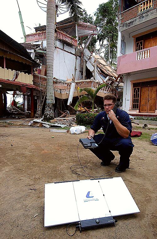 2005 Nias–Simeulue earthquake: U.S. Navy communicates with Military Sealift Command hospital ship USNS Mercy (T-AH-19) using Inmarsat satellite telephone in Nias (April 2005).