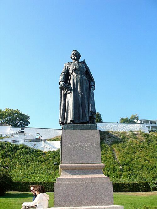 The statue of Jacques Marquette, Jesuit priest and Great Lakes explorer, in front of Fort Mackinac