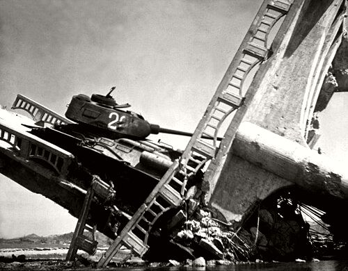 North Korean T-34-85 caught on a bridge south of Suwon by US attack aircraft in the Korean War
