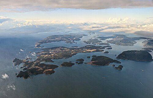 Aerial view of the San Juan Islands from the southeast showing Lopez Island in the foreground